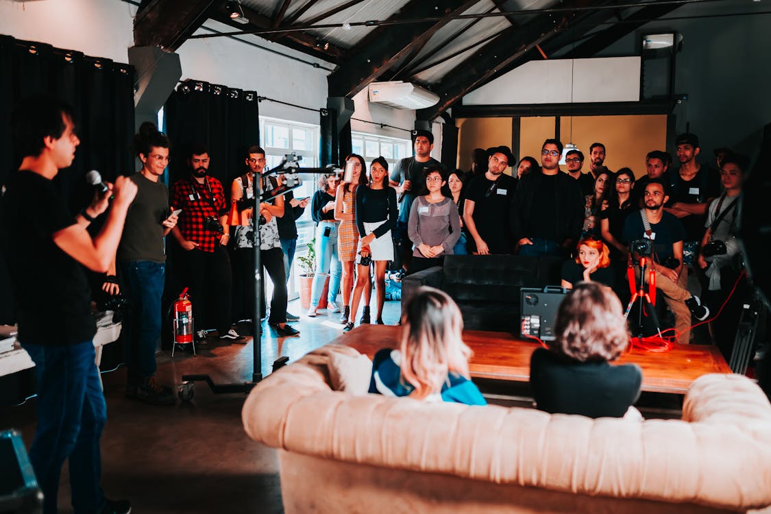 An event like this needs a registration system that can handle the crowd without creating a queue. QR codes move sign-ups to people's phones. Photo by Matheus Bertelli.