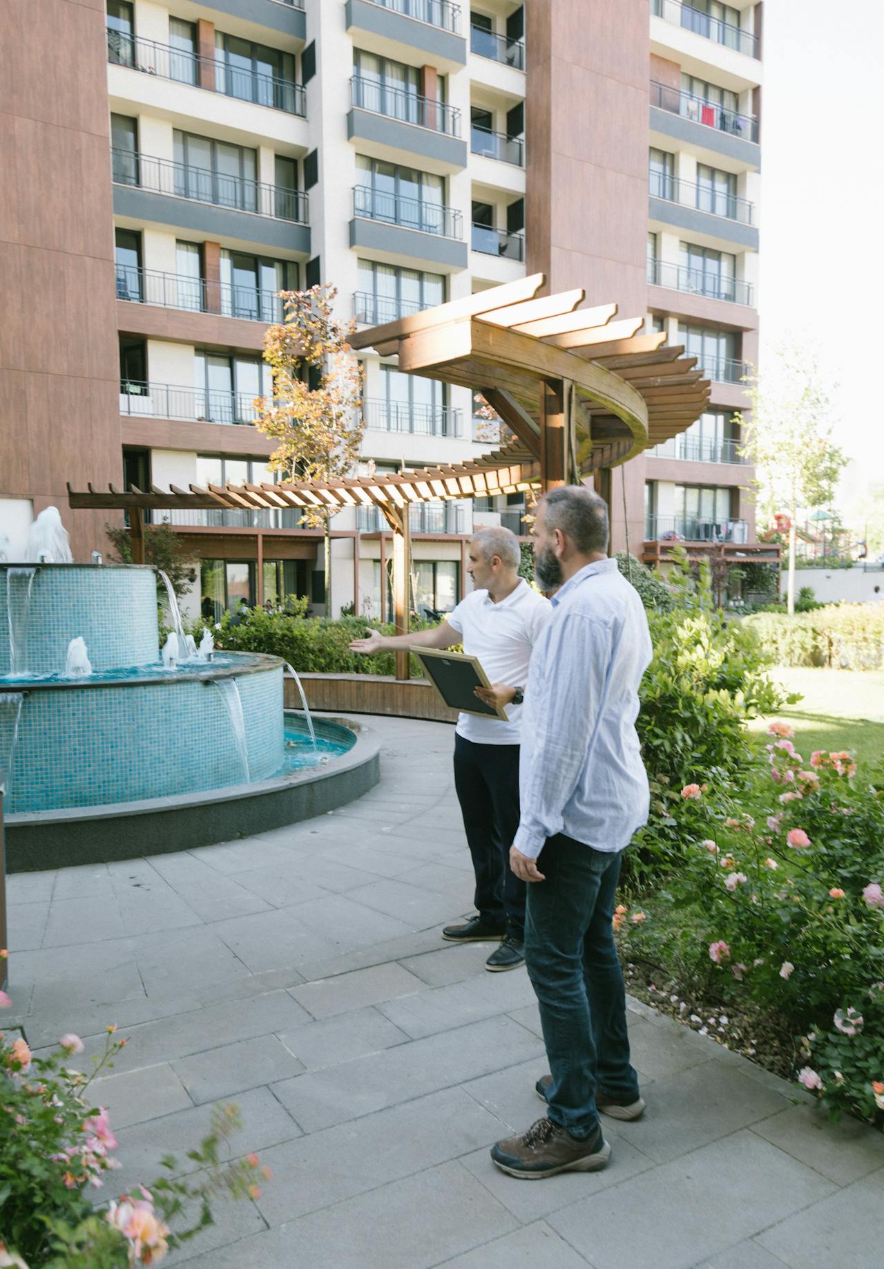 Documenting each room with dated photos during a property walkthrough. Photo by Meruyert Gonullu.
