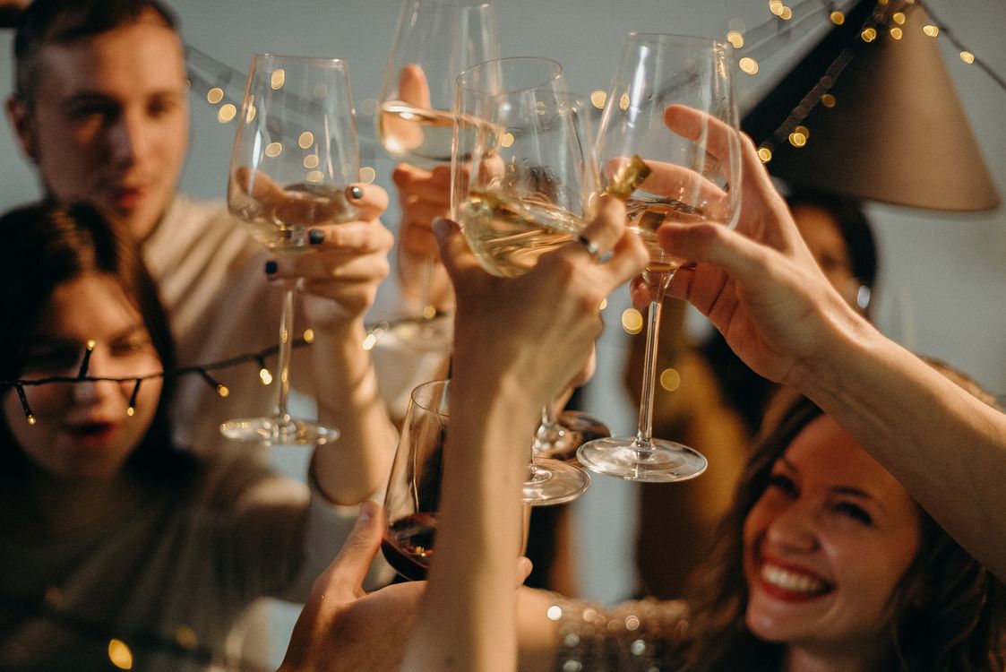 Guests are more relaxed and more fun on camera later in the evening. Whatever alternative you choose, place it where the energy is highest. Photo by cottonbro studio.